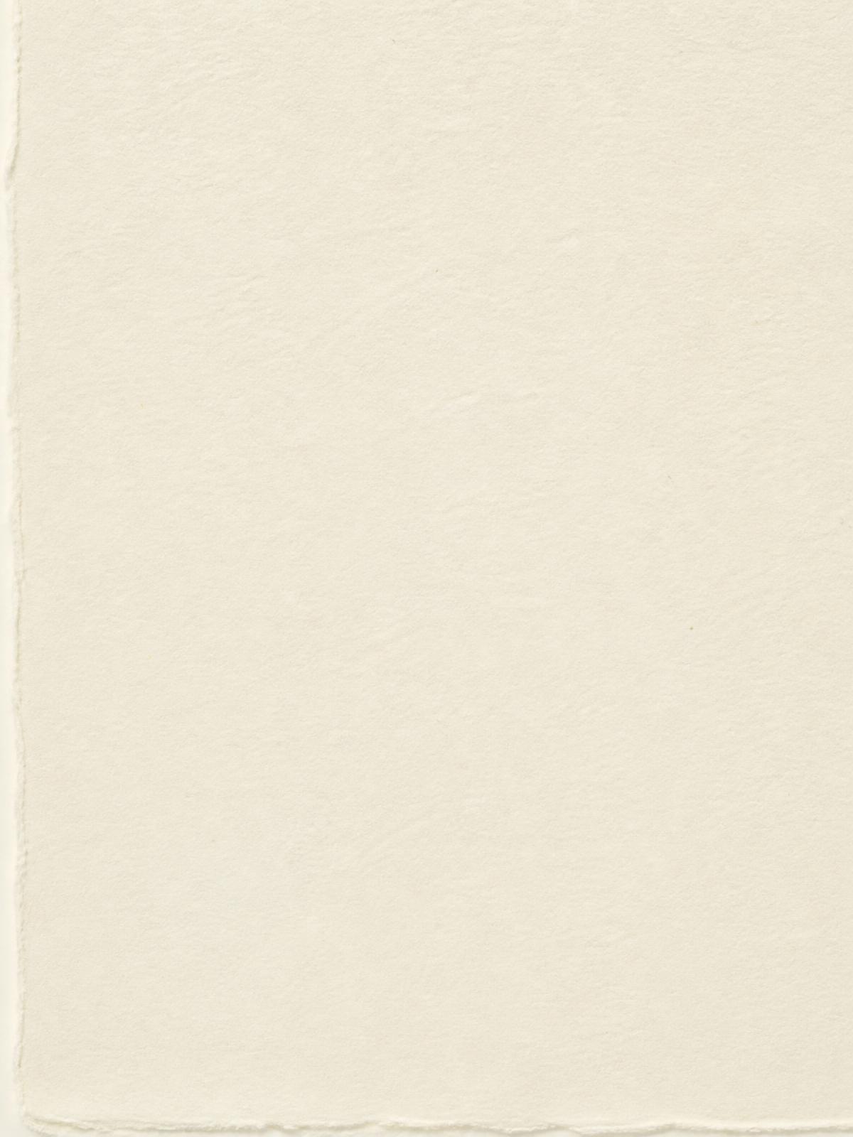 A pale, restrained swatch of NOOSH Egret gel polish — a marshmallow-cream neutral photographed close.